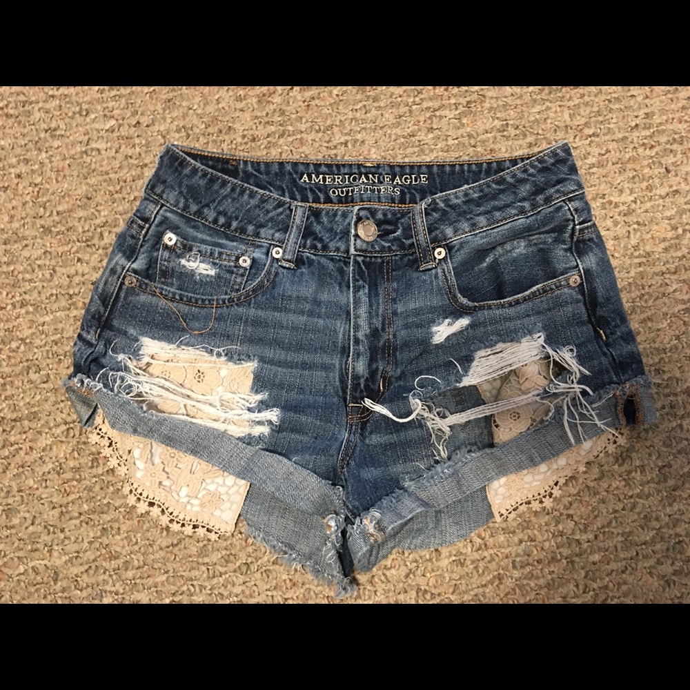 American Eagle jean shorts with laced pockets